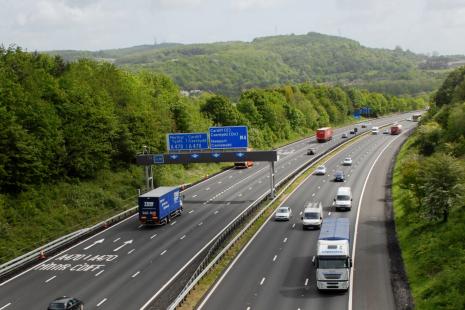 Long shot of M4 mptorway in South Wales with cars and lorries.